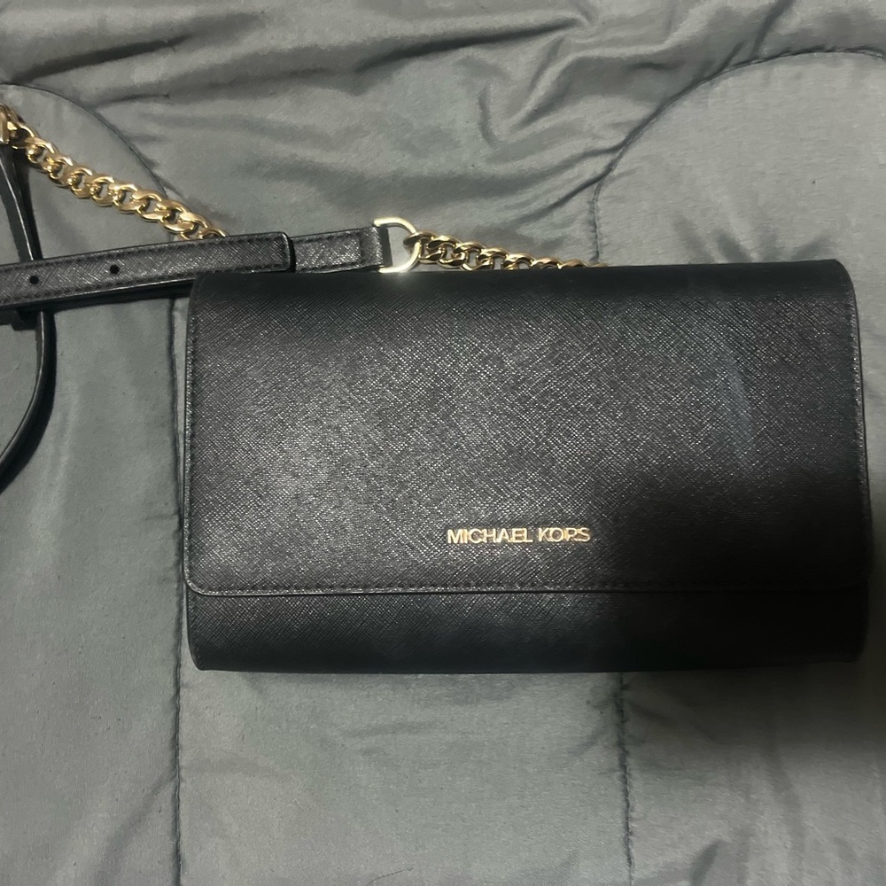 Authentic Michael Kors crossbody purse.